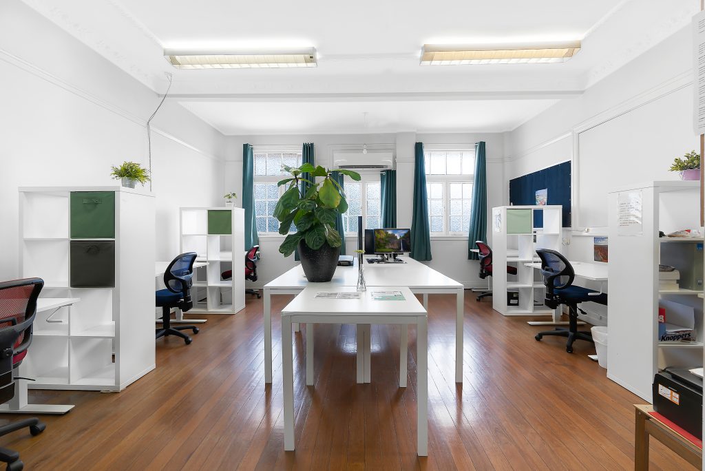 hot desks position in a boutique coworking space in new farm