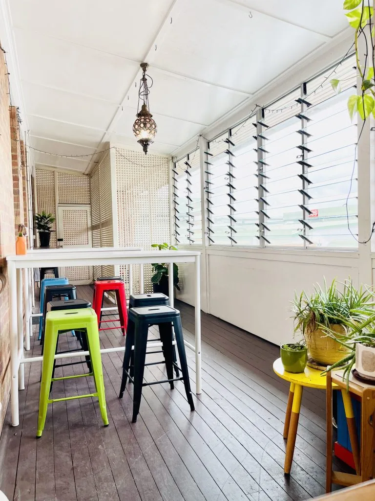 Bench seating by the windows at Salt Space Coworking
