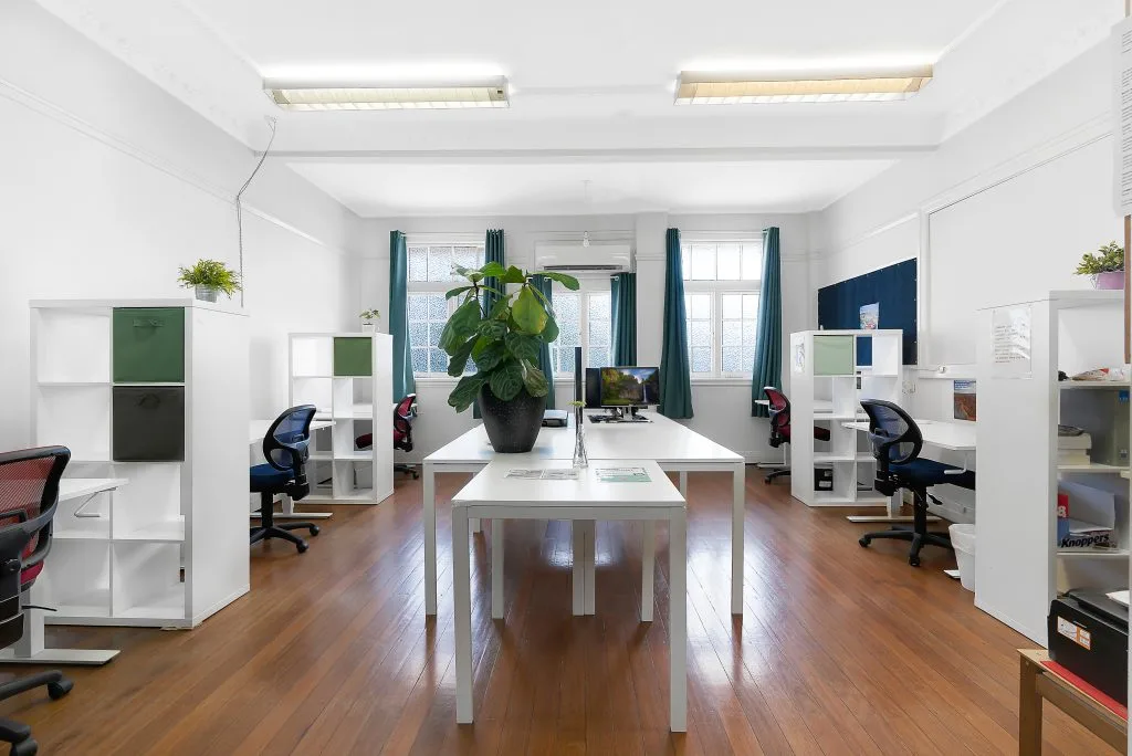hot desks position in a boutique coworking space in new farm